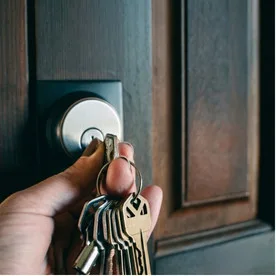 Rekeying residential door lock with new keys in North Vancouver